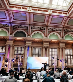 Conference with man on stage