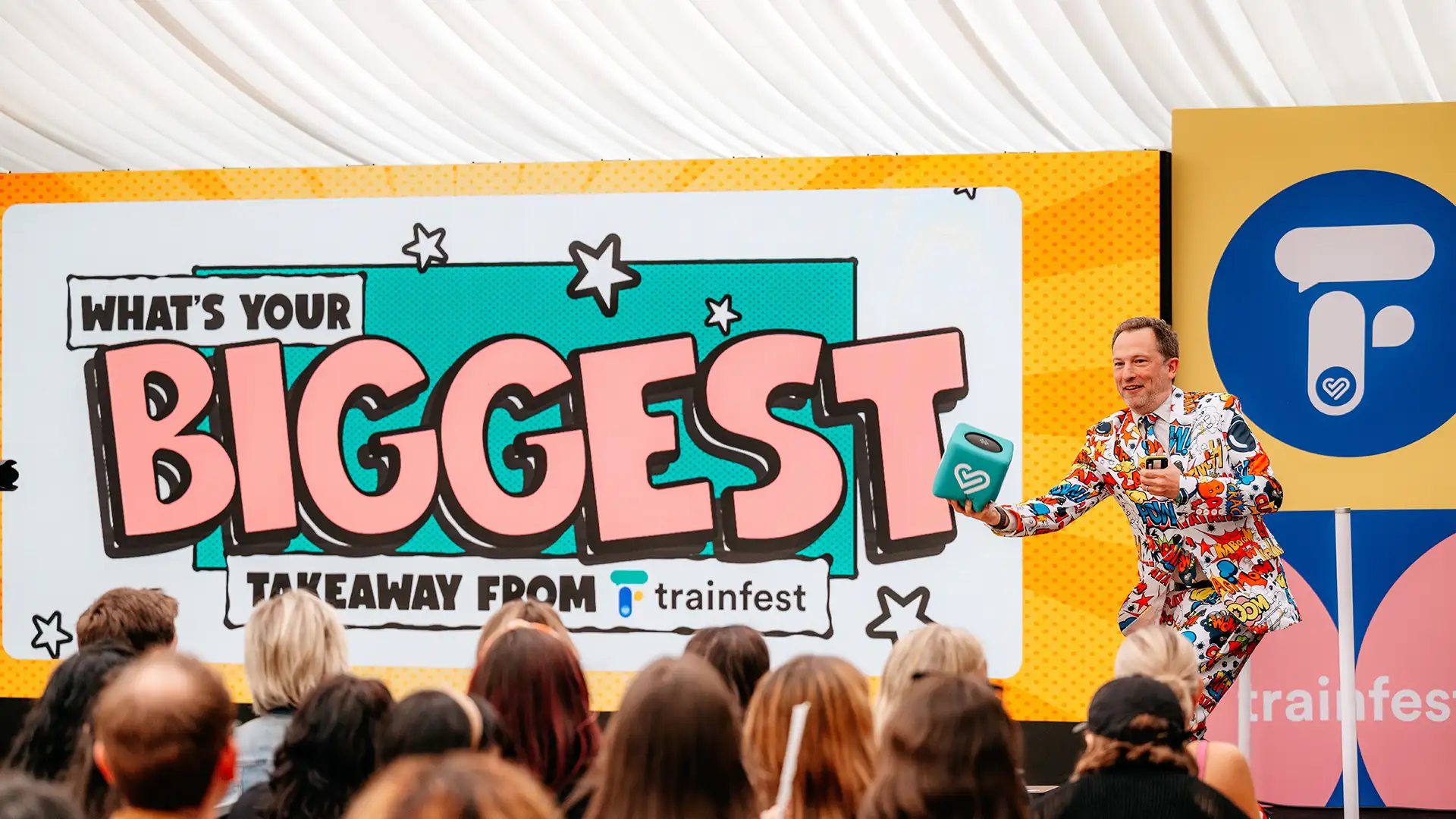 Event host on stage with content