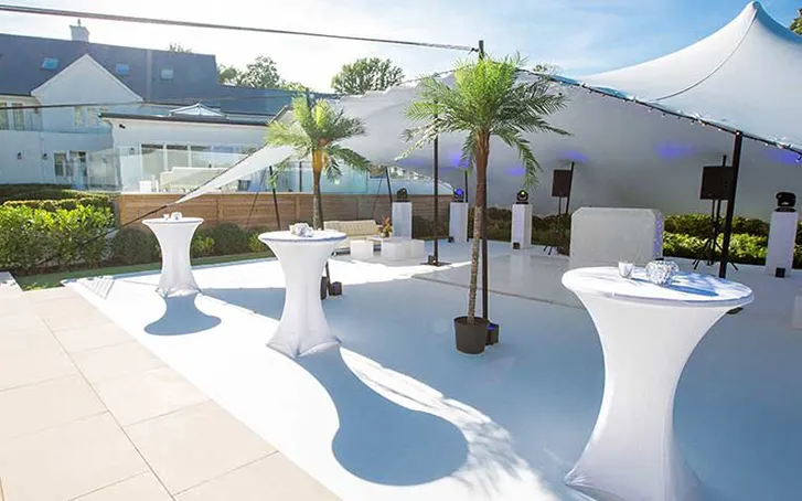 Summer party white stretch tent set up with dance floor