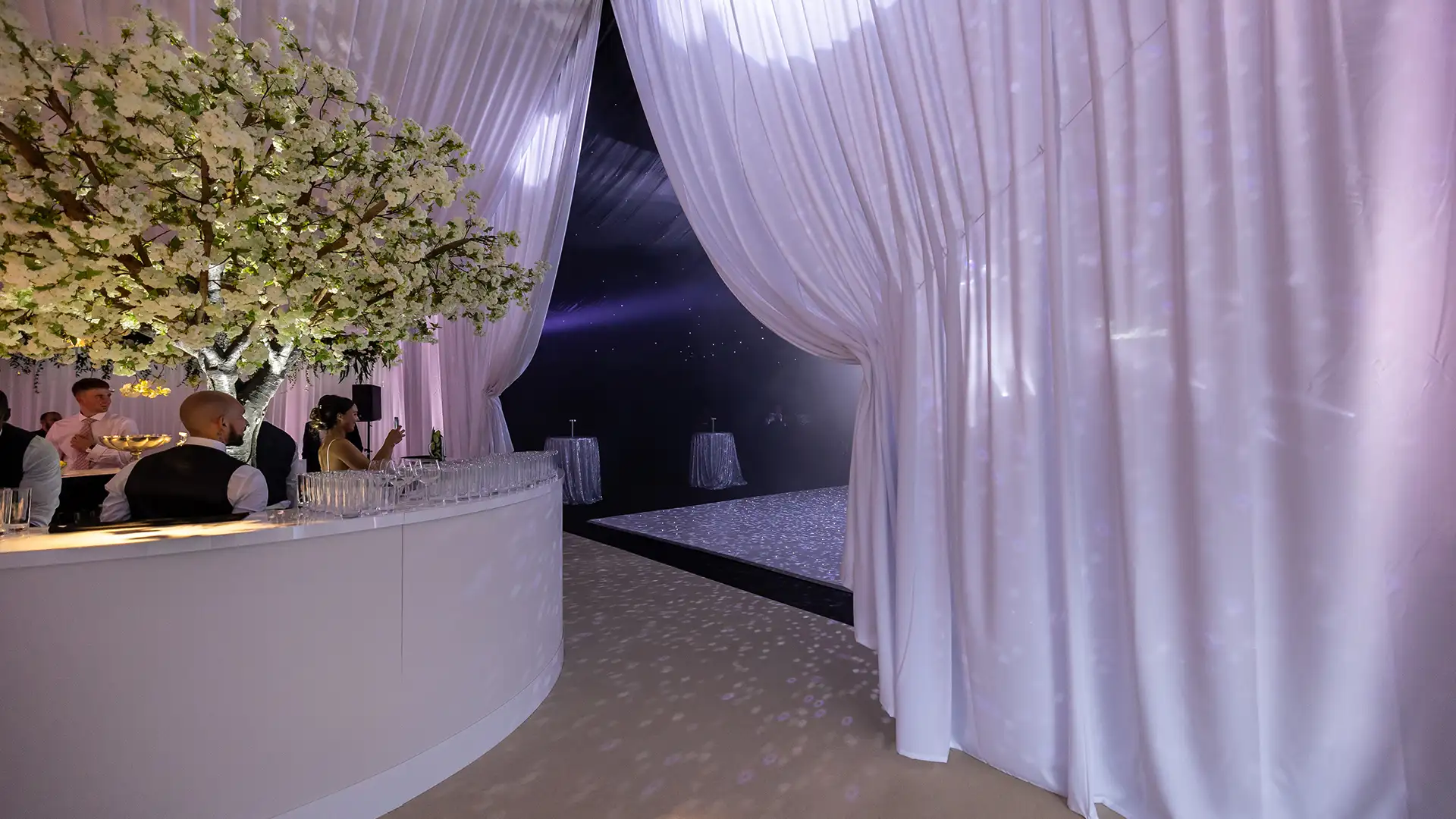 Reveal curtain in wedding marquee