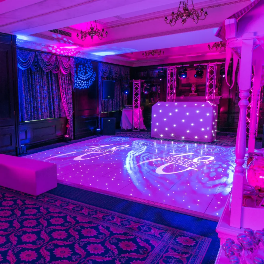 DJ set up and white dancefloor