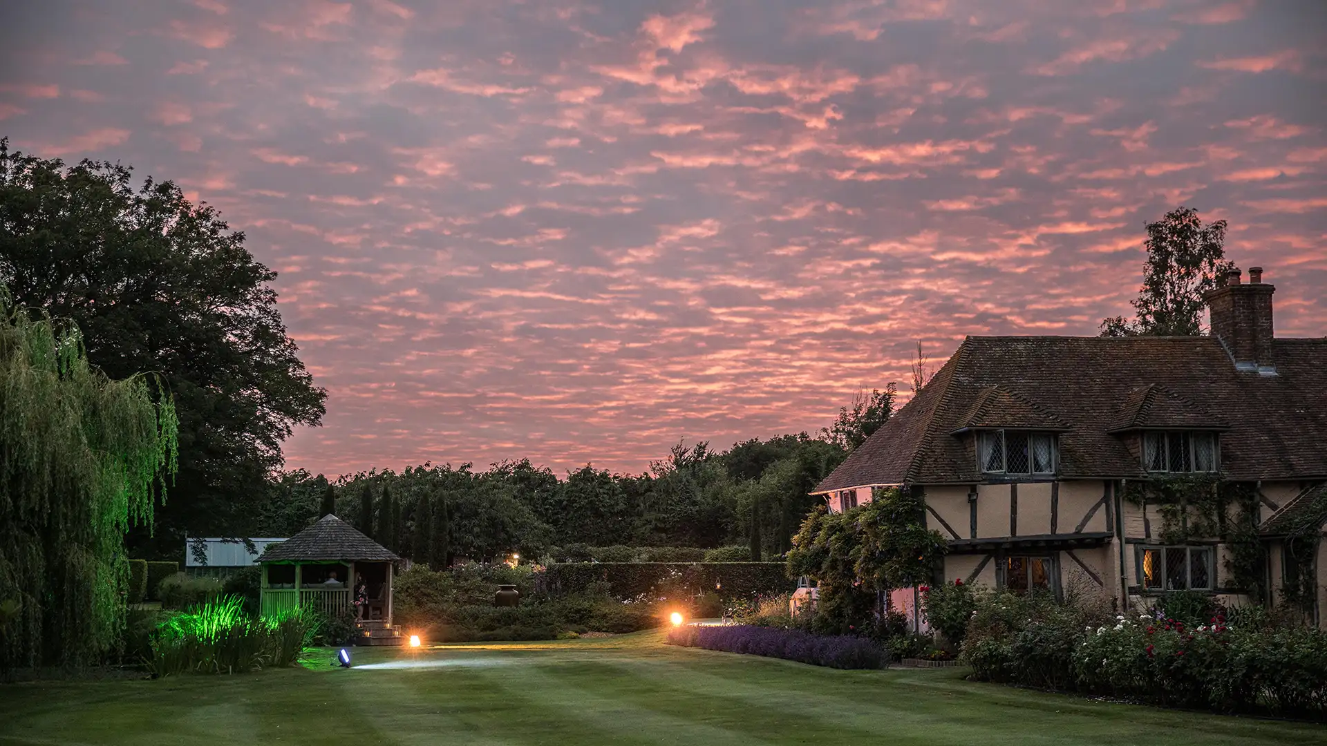 Sunset over house and grounds