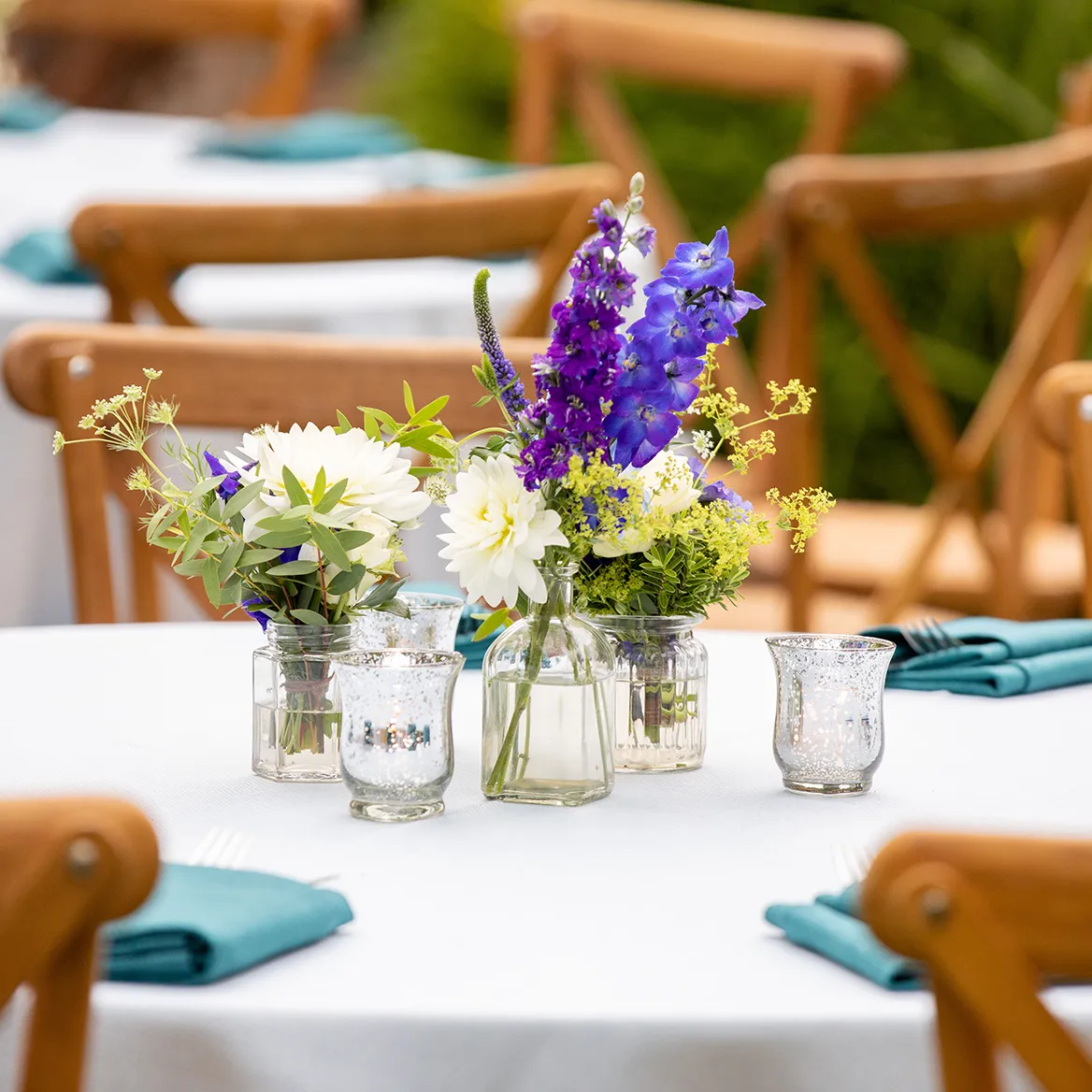 Purple and white flowers table centrepieces