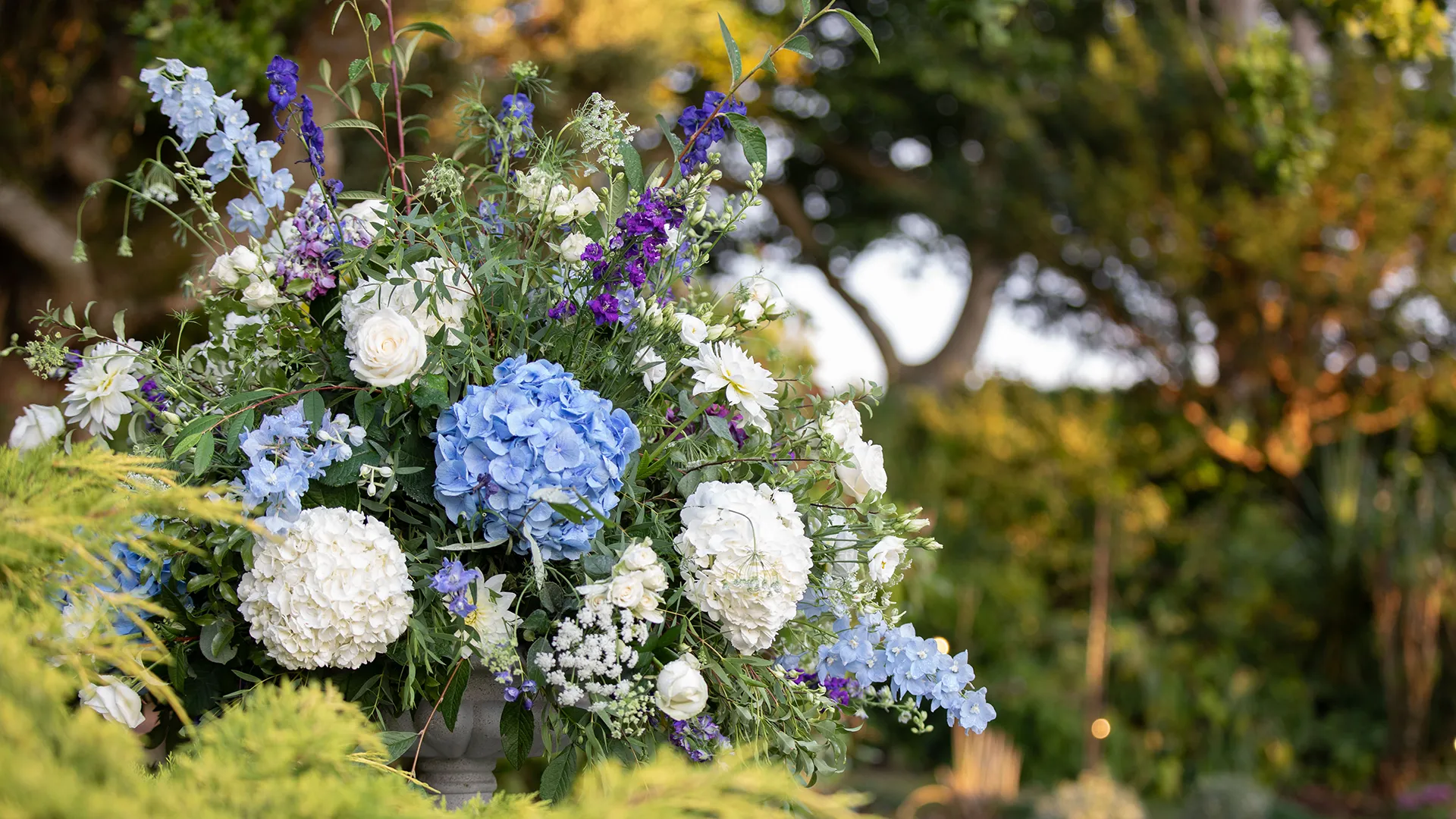 Stunning large, purple and white floral arrnagement