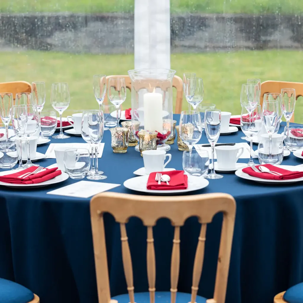 Gold chairs and blue table clothes