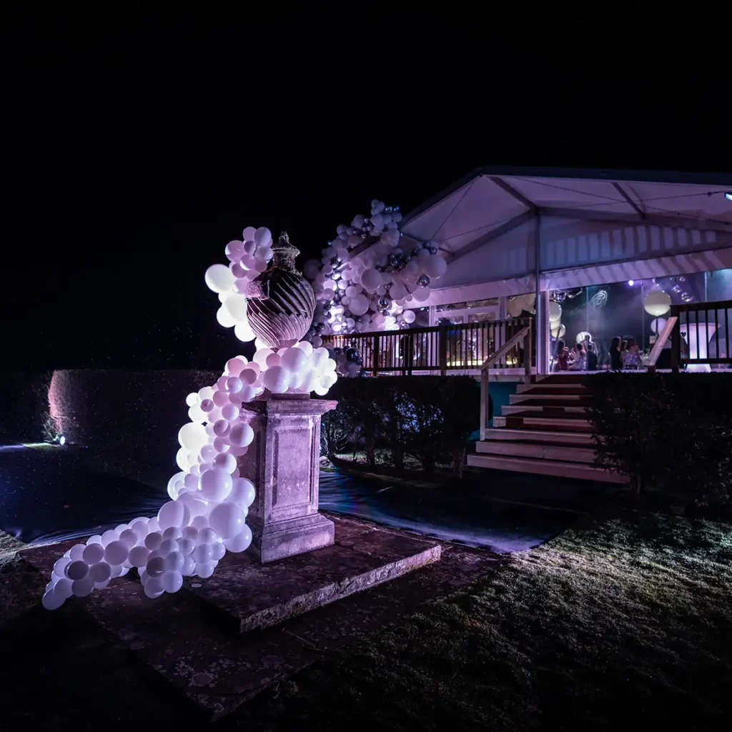 Marquee exterior with balloons on fountain