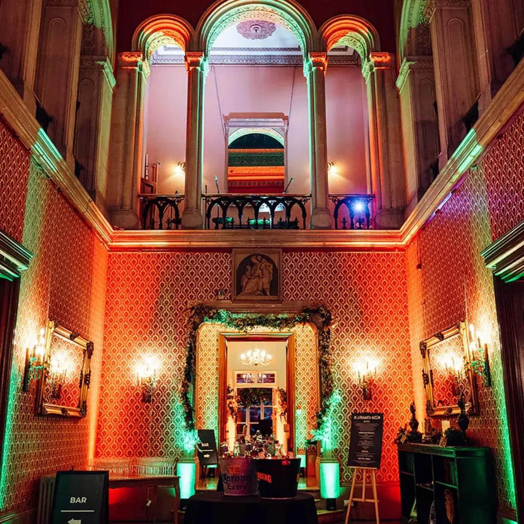 Orange and green wash lighting of internal house