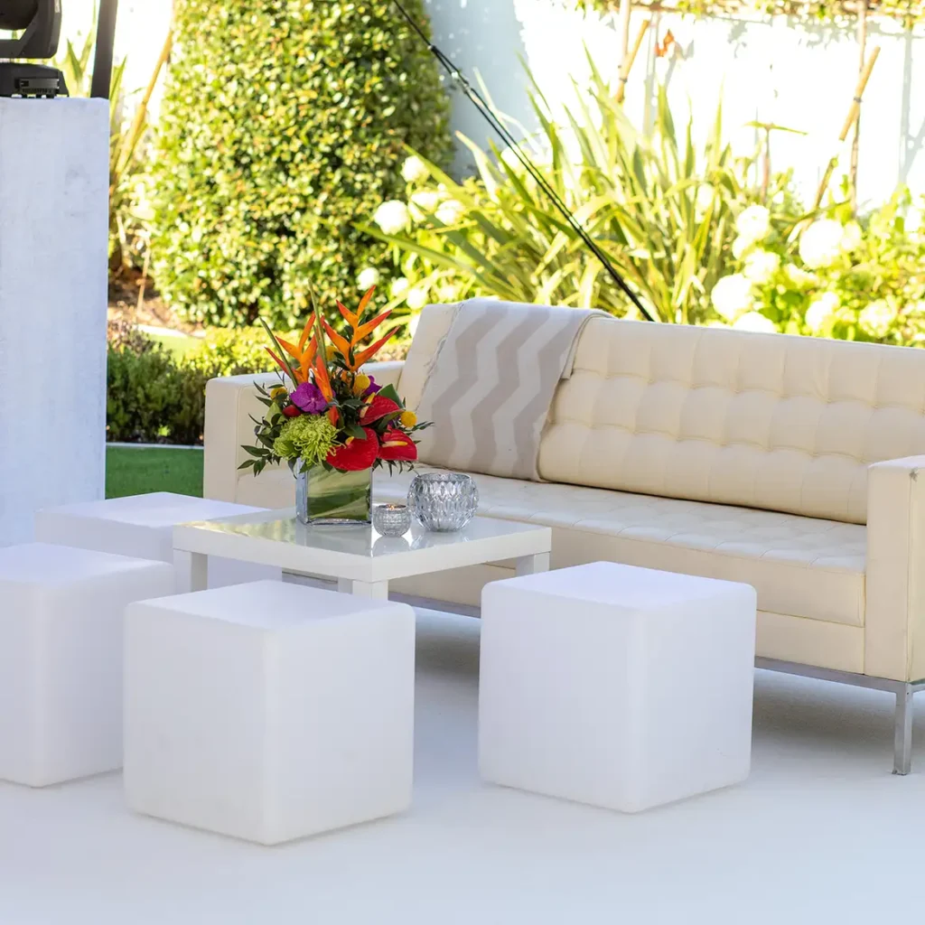 White cubed furniture and sofa with florals