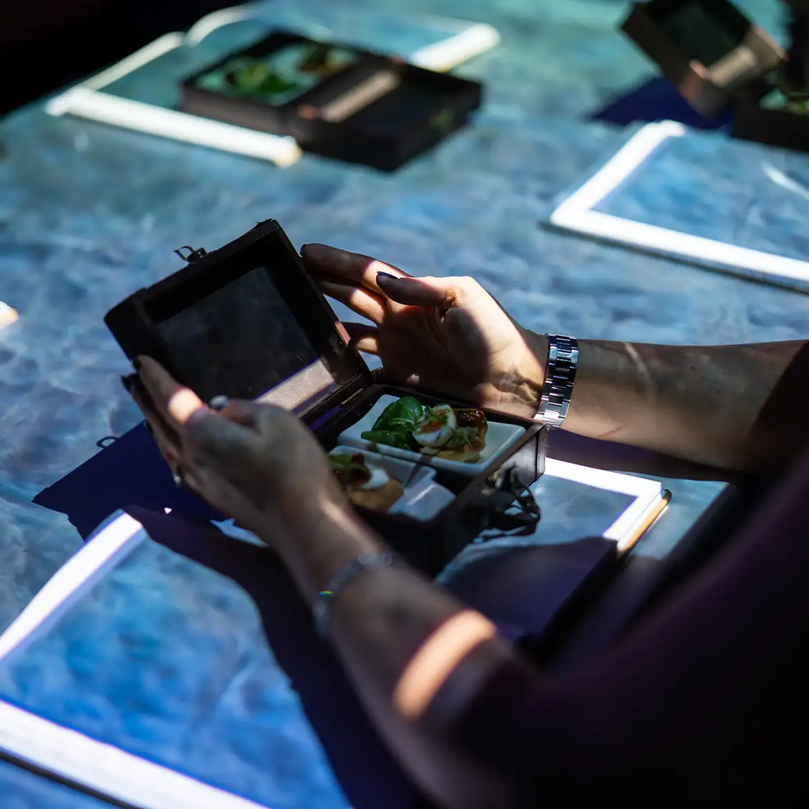 Immersive dining experience for an event near London - projected dinner on table