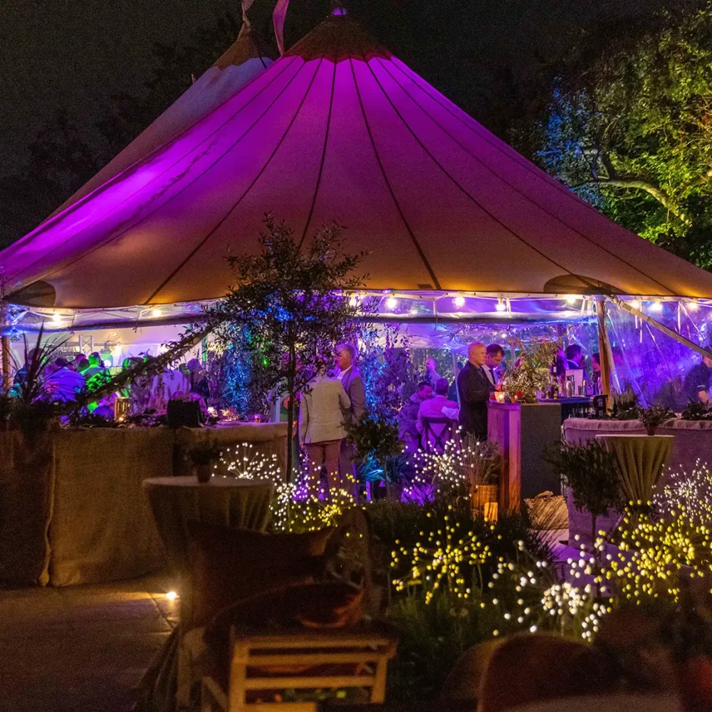Magical evening lighting for marquee wedding