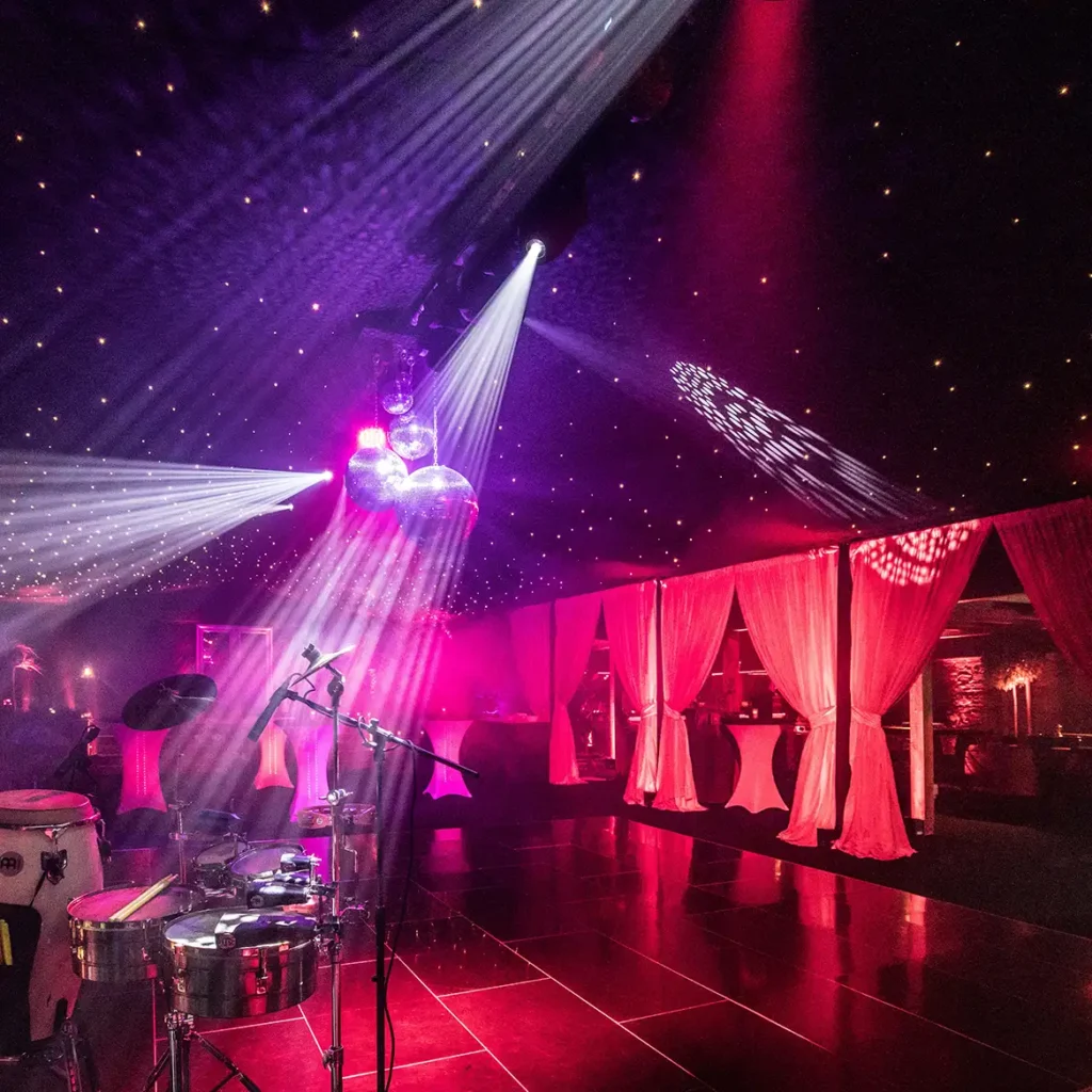 Dance area of black and red themed marquee