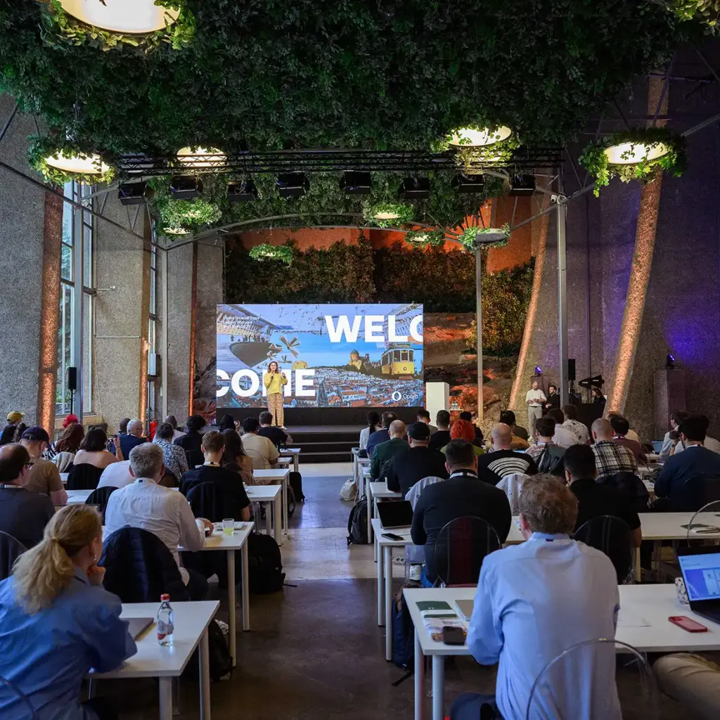 Large video screen and stage in event venue for product launch