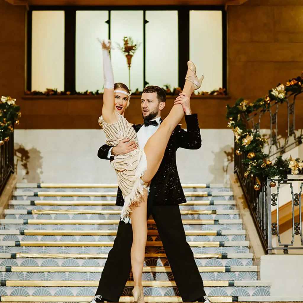1920s dancers on stairs