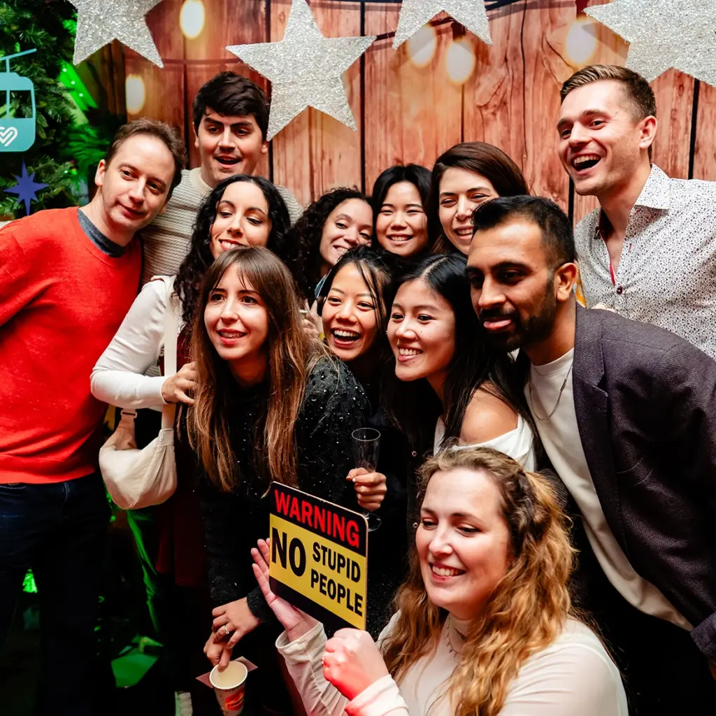 Party goers pose for a picture
