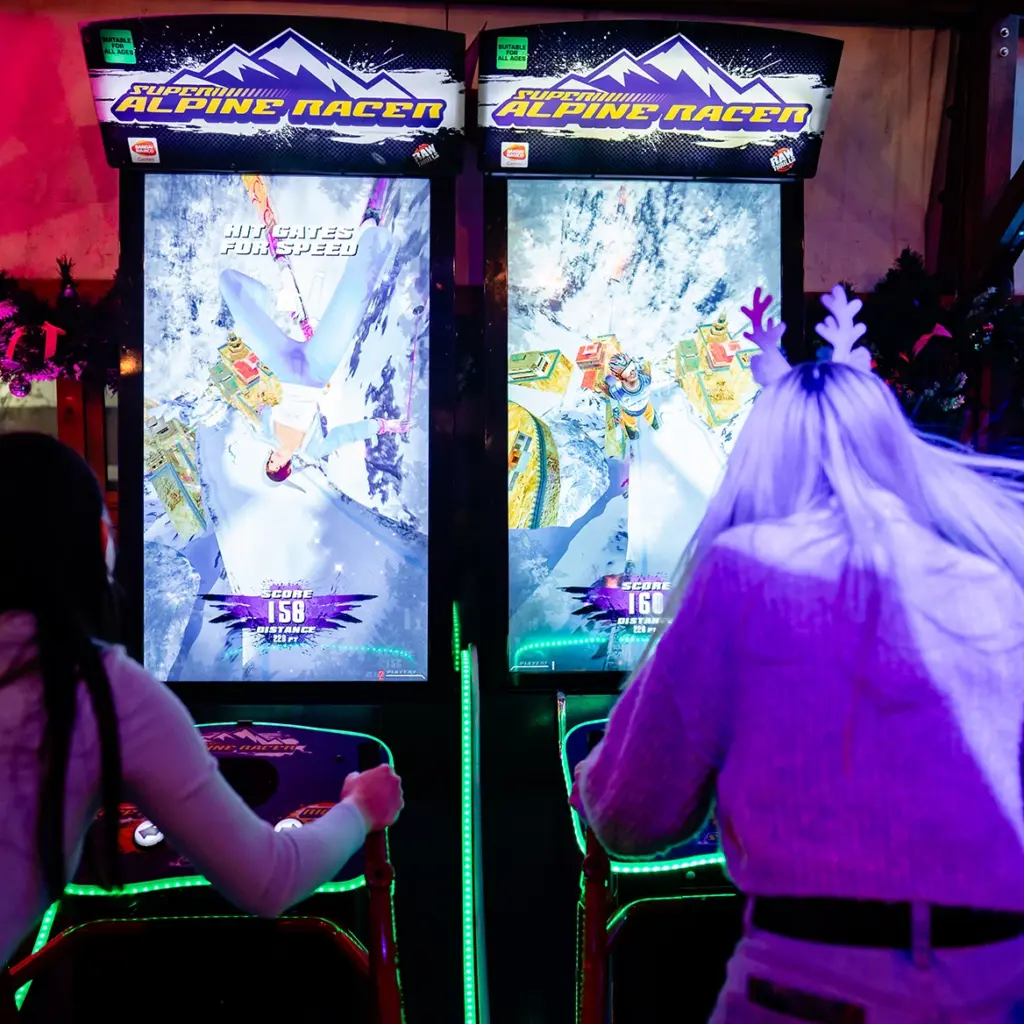 Party goers use the ski game