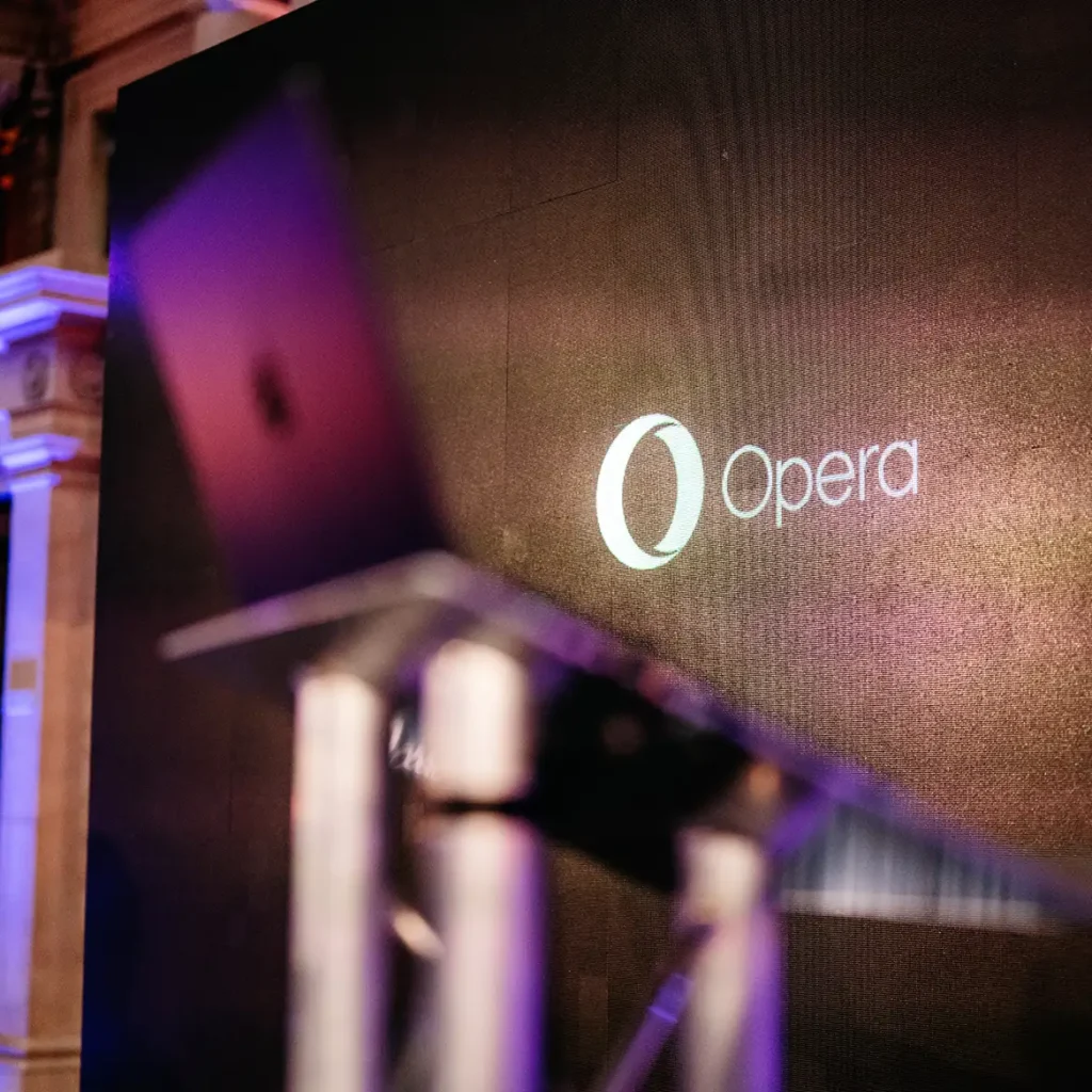 Large LED screen with brand logo projected