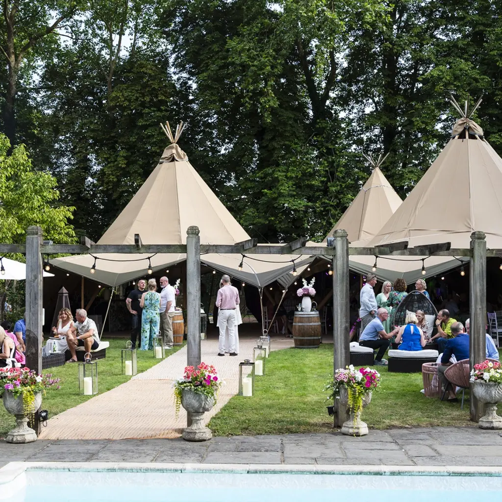 Giant tipi tents in private party home garden for Luxury 60th Birthday Marquee party
