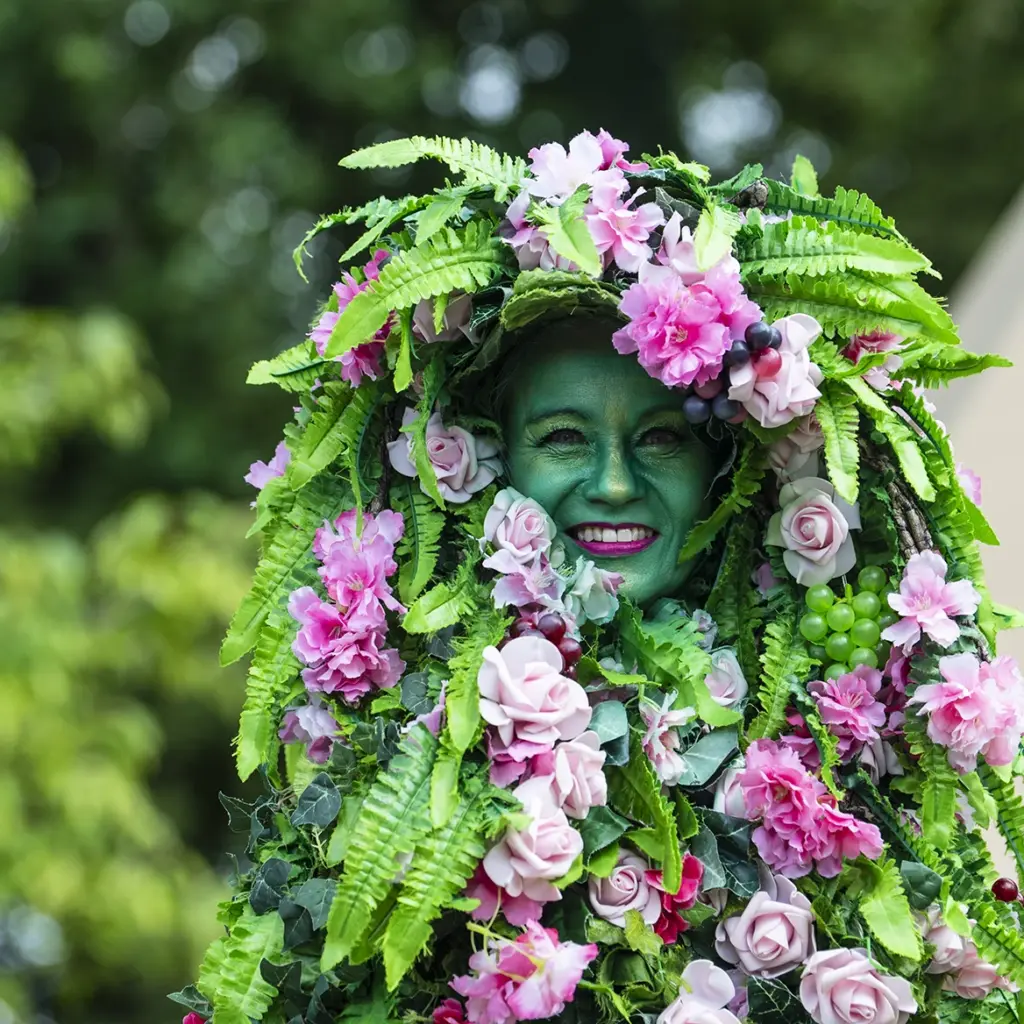 Roaming botanical stilt walker at private event