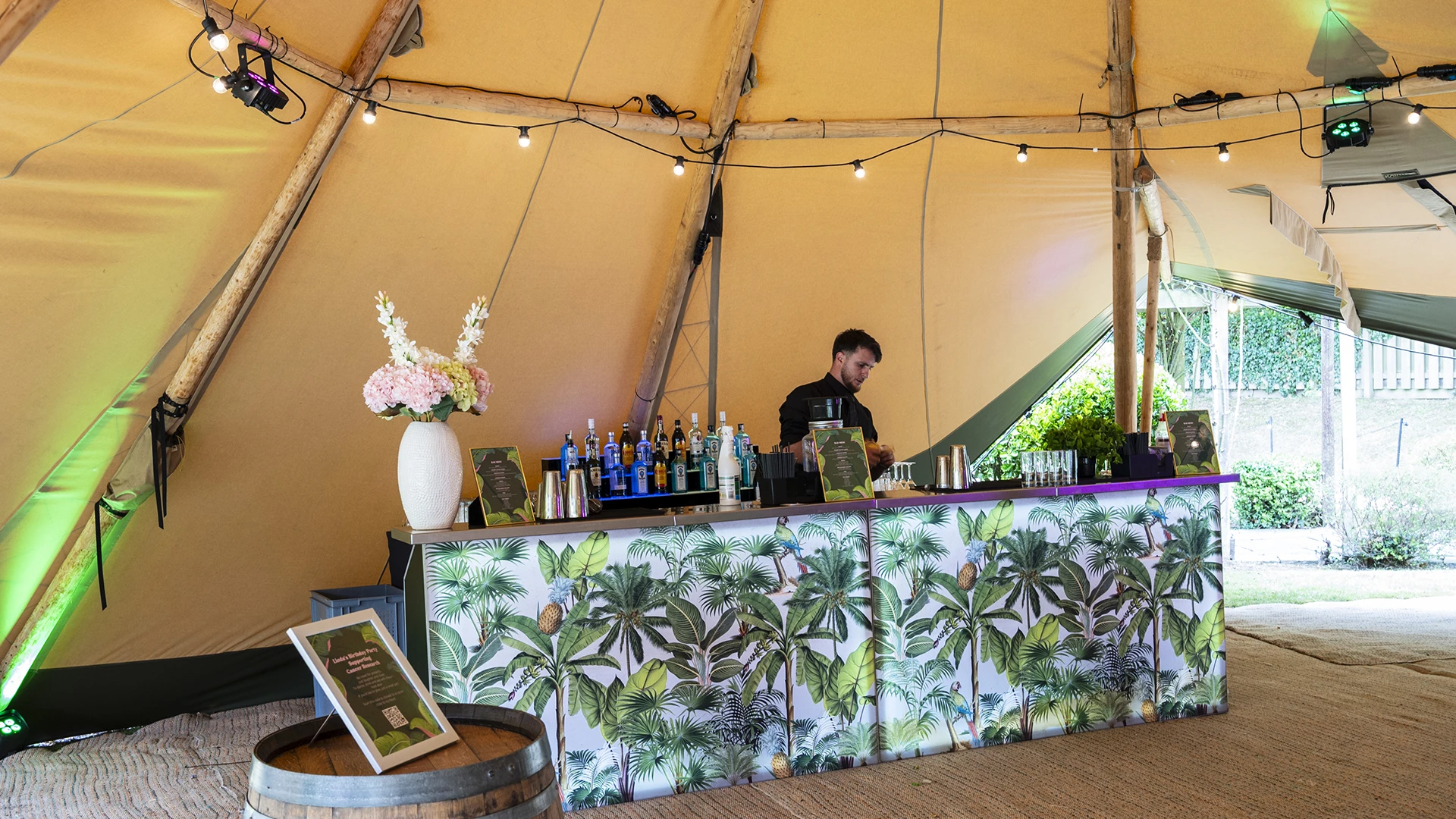 Bespoke garden themed bar serving luxury cocktails at Luxury 60th Birthday Marquee