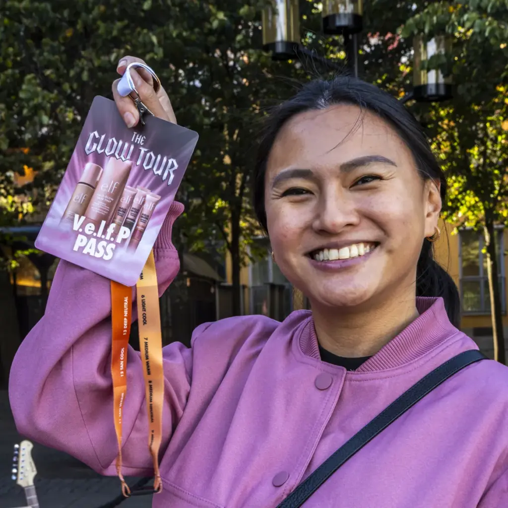 Influencer with VIP guest pass for brand activation roadshow