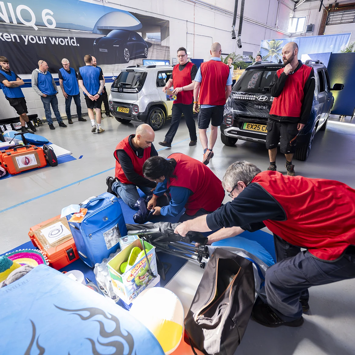 Attendees view goodies at a product launch event